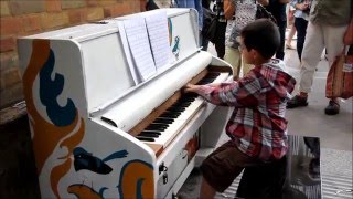 10 year old George Harliono playing street piano at a train station [upl. by Salsbury]