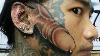 15 Craziest Face Tattoos [upl. by Nosirb]