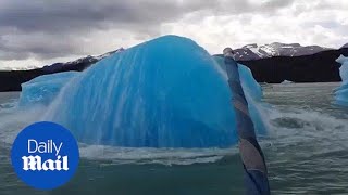 Extraordinary moment massive iceberg explodes next to boat [upl. by Goulette]