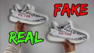 REAL VS FAKE ADIDAS YEEZY BOOST 350 V2 ZEBRA COMPARISON 2020 VERSION [upl. by Virginie]