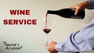 Wine service Sommelier How to open a bottle of wine Decanting wine in fine dining service [upl. by Martainn]