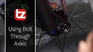 How To Use Bolt Through Axles  Tech Tip  Tredz Bikes [upl. by Anayeek34]