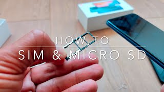 How to insert SIM amp micro SD  Redmi Note 9 [upl. by Ellahcim]