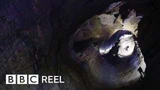 The daring journey inside the worlds deepest cave  BBC REEL [upl. by Alrick303]