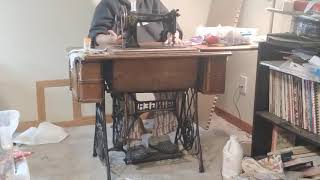 Learning how to use a treadle sewing machine [upl. by Enyallij673]